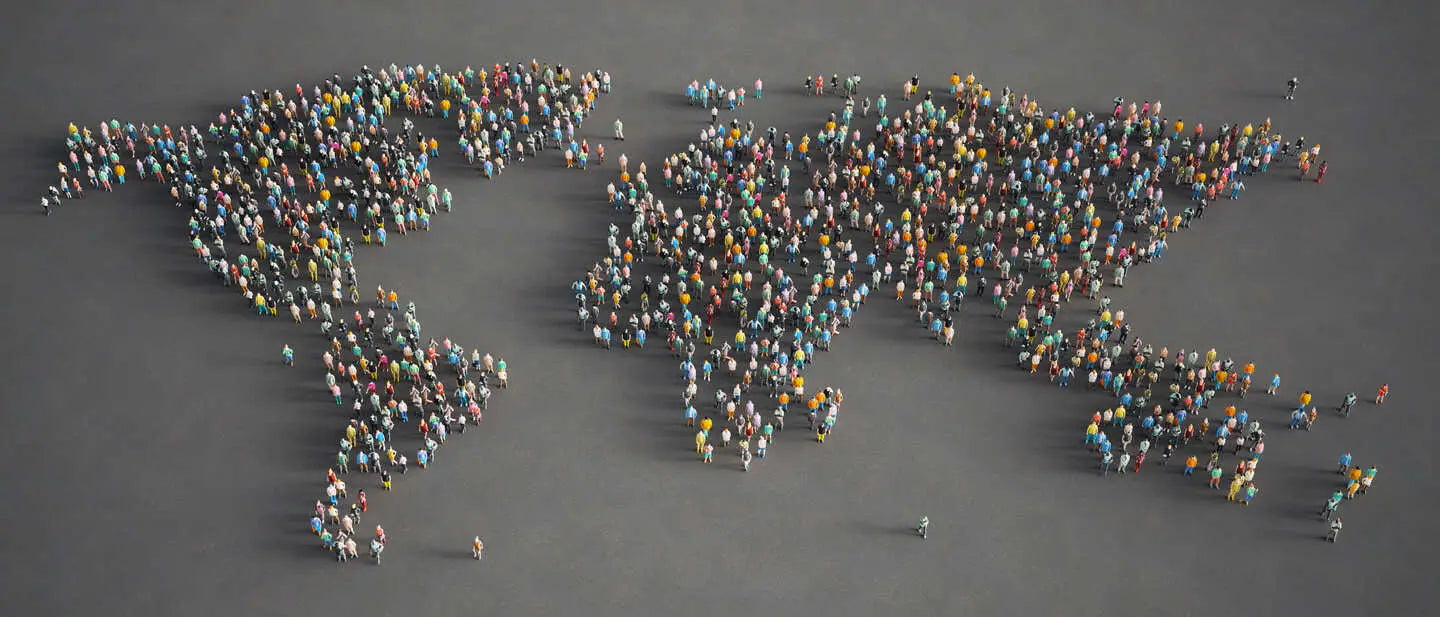 People in the shape of a world map spread across a dark gray background